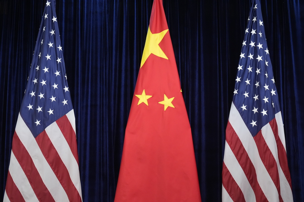 FILE - Flags of the U.S. and China are displayed at the Gimhae International Airport in Busan, South Korea, Oct. 30, 2025. (AP Photo/Mark Schiefelbein, file)