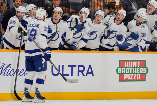 Tampa Bay Lightning center Zemgus Girgensons (28) celebrates his goal with teammates during the first period of an NHL hockey game against the Nashville Predators, Tuesday, Oct. 28, 2025, in Nashville, Tenn. (AP Photo/George Walker IV) Tampa Bay Lightning center Zemgus Girgensons (28) celebrates his goal with teammates during the first period of an NHL hockey game against the Nashville Predators, Tuesday, Oct. 28, 2025, in Nashville, Tenn. (AP Photo/George Walker IV)
