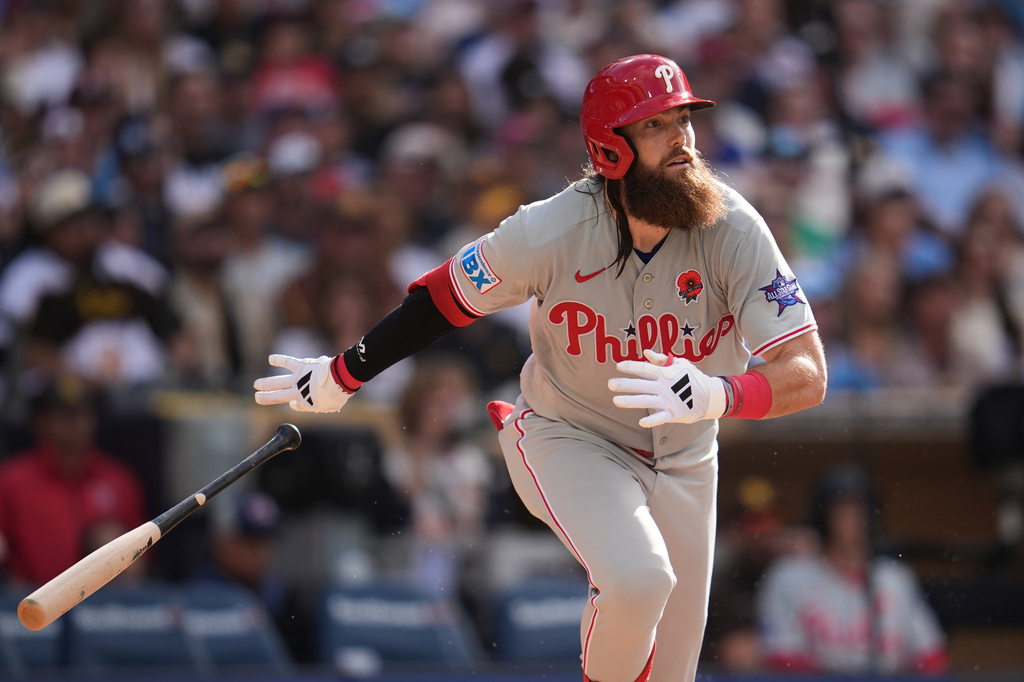 Philadelphia Phillies' Brandon Marsh watches his two-run home run during the seventh inning of a baseball game against the San Diego Padres Monday, May 25, 2026, in San Diego. (AP Photo/Gregory Bull)