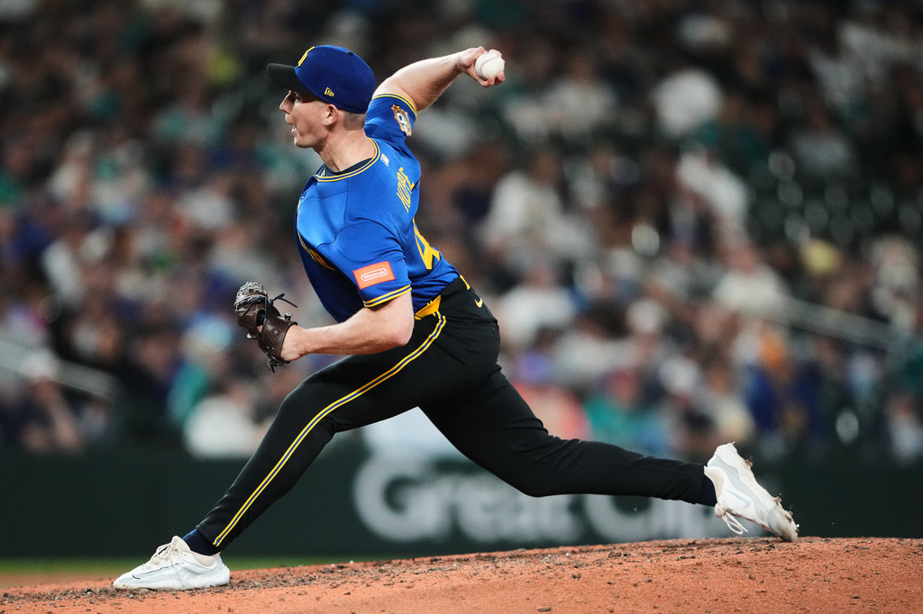 Seattle Mariners relief pitcher Alex Hoppe throws against the Kansas City Royals during the ninth inning of a baseball game, Friday, May 1, 2026, in Seattle. (AP Photo/Lindsey Wasson)