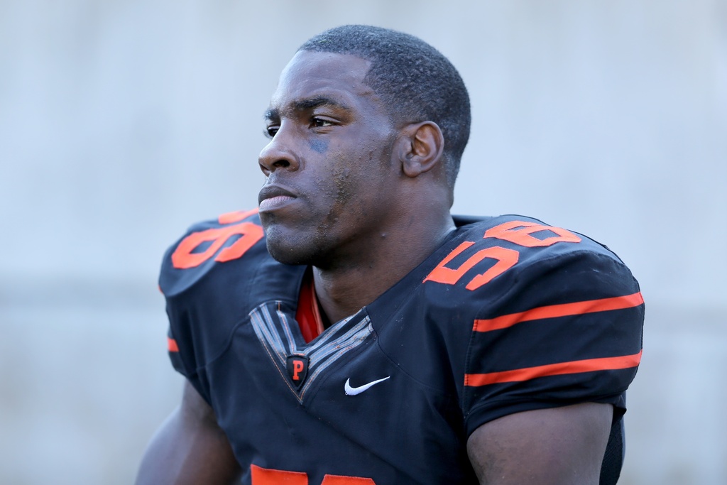 FILE - Princeton Tigers Marcus Stroud sits on the bench late in a game against the Harvard Crimson during a college football game, Oct. 25, 2014 in Princeton, NJ. (AP Photo/Gregory Payan, File)