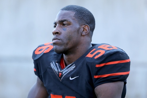 FILE - Princeton Tigers Marcus Stroud sits on the bench late in a game against the Harvard Crimson during a college football game, Oct. 25, 2014 in Princeton, NJ. (AP Photo/Gregory Payan, File) FILE - Princeton Tigers Marcus Stroud sits on the bench late in a game against the Harvard Crimson during a college football game, Oct. 25, 2014 in Princeton, NJ. (AP Photo/Gregory Payan, File)