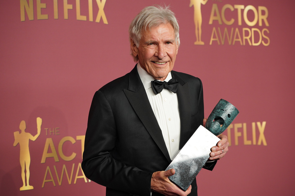 Harrison Ford poses in the press room with the lifetime achievement award during the 32nd Annual Actor Awards on Sunday, March 1, 2026, at the Shrine Auditorium and Expo Hall in Los Angeles. (Photo by Jordan Strauss/Invision/AP)