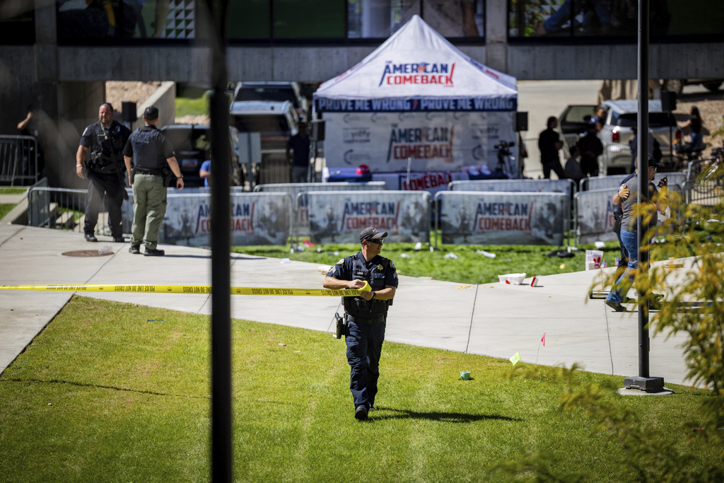Law enforcement tapes off an area after Charlie Kirk, the CEO and co-founder of the conservative youth organization Turning Point USA, was shot at the Utah Valley University, Wednesday, Sept. 10, 2025, in Orem, Utah. (Tess Croewley/The Deseret News via AP)
