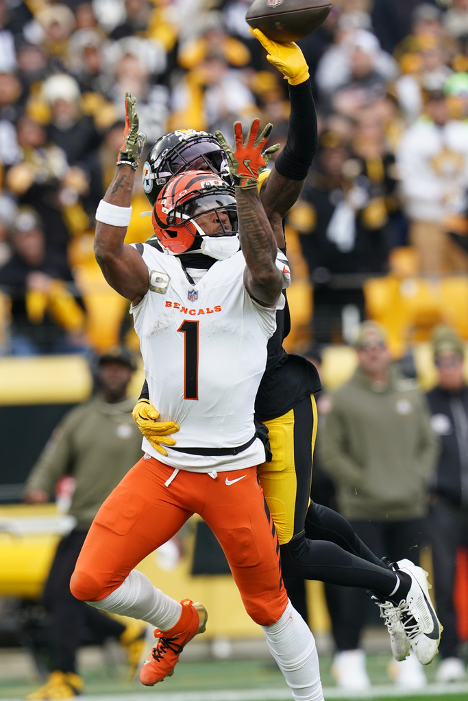 Pittsburgh Steelers cornerback James Pierre (42) breaks up a pass intended for Cincinnati Bengals wide receiver Ja'Marr Chase (1) during the first half of an NFL football game Sunday, Nov. 16, 2025, in Pittsburgh. (AP Photo/Matt Freed)