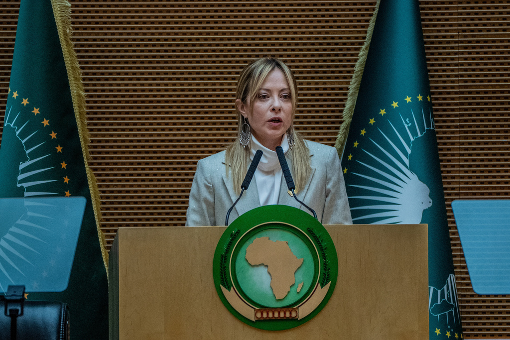 Italian Prime Minister Giorgia Meloni addresses the annual African Union Summit at the Addis International Convention Center in Addis Ababa, Ethiopia, Saturday, Feb. 14, 2026. (AP Photo/Amanuel Sileshi)