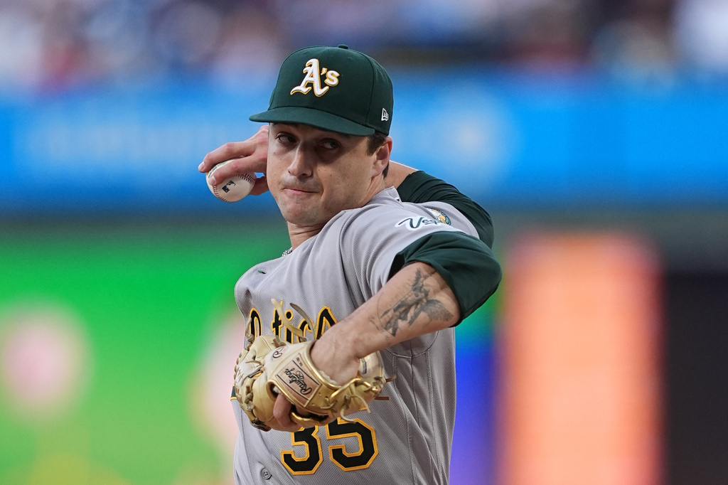 Athletics' Jeffrey J.T. Ginn throws during the first inning of a baseball game against the Philadelphia Phillies, Thursday, May 7, 2026, in Philadelphia. (AP Photo/Matt Rourke)