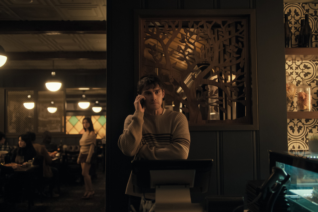 This image released by Focus Features shows Inde Navarrette and Michael Johnston in a scene from "Obsession." (Focus Features via AP)