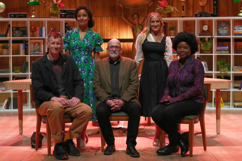 The Booker Prize 2025 judges, left to right, writer Chris Power, author Kiley Reid, 1993 Booker Prize winner Roddy Doyle, actor Sarah Jessica Parker, and Booker Prize-longlisted novelist Ayobami Adebayo, pose for a photo during the the Booker Prize 2025 shortlist announcement event, held at Southbank Centre, in London, Tuesday, Sept. 23, 2025. (AP Photo/Joanna Chan)