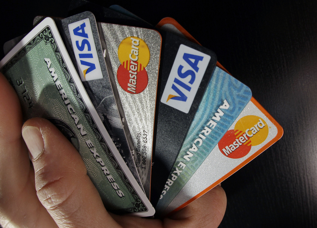 FILE - In this March 5, 2012, file photo, consumer credit cards are posed in North Andover, Mass. (AP Photo/Elise Amendola, File)