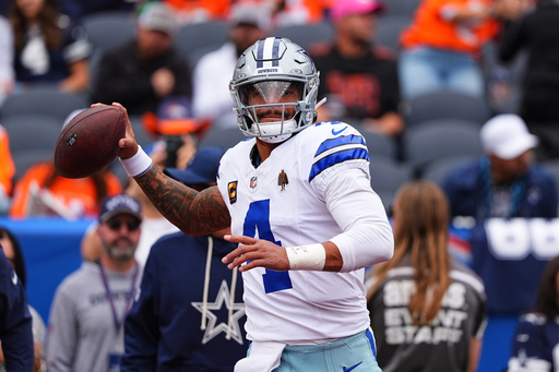Dallas Cowboys quarterback Dak Prescott warms up before an NFL football game against the Denver Broncos Sunday, Oct. 26, 2025, in Denver. (AP Photo/Jack Dempsey) Dallas Cowboys quarterback Dak Prescott warms up before an NFL football game against the Denver Broncos Sunday, Oct. 26, 2025, in Denver. (AP Photo/Jack Dempsey)