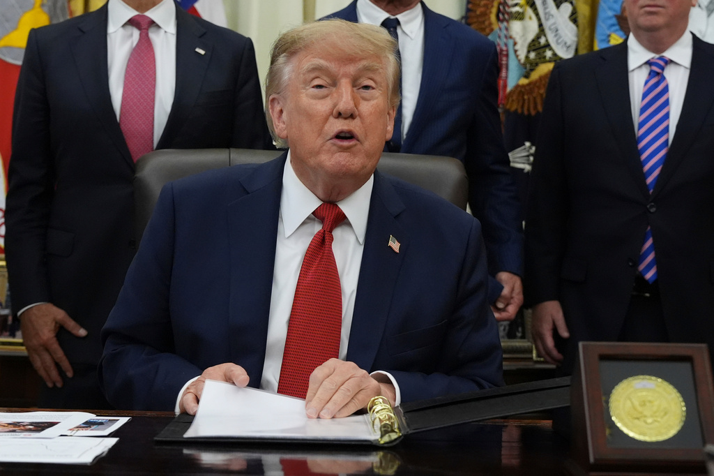 President Donald Trump speaks about healthcare in the Oval Office of the White House, Friday Sept. 18, 2026, in Washington. (AP Photo/Jacquelyn Martin)