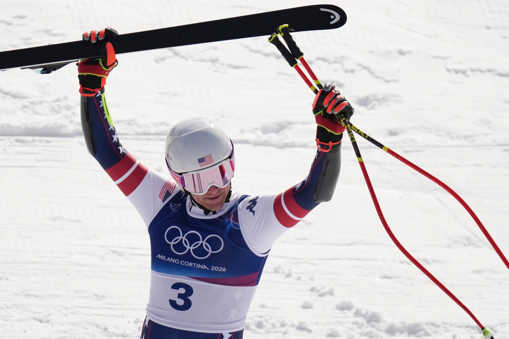 United States' Ryan Cochran Siegle celebrates at the finish area of an alpine ski, men's super-G race, at the 2026 Winter Olympics, in Bormio, Italy, Wednesday, Feb. 11, 2026. (AP Photo/Rebecca Blackwell)