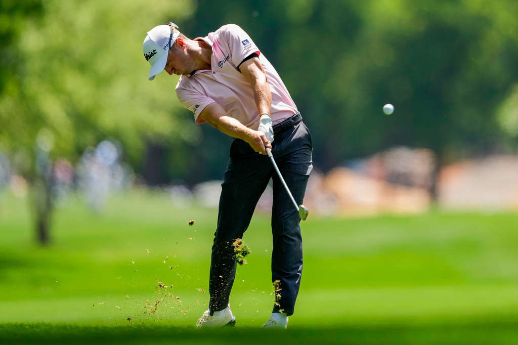 Justin Thomas hits from the second fairway during second round of the Truist Championship golf tournament at the Quail Hollow Club, Friday, May 8, 2026, in Charlotte, N.C. (AP Photo/Chris Carlson)