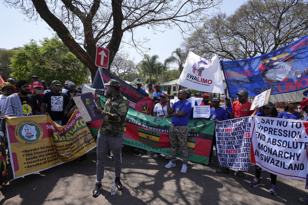 A leader of Eswatin Pro-democracy activists, speaks during their protest outside the U.S. Embassy in Pretoria, South Africa, Friday, Sept. 19, 2025. (AP Photo/Themba Hadebe)