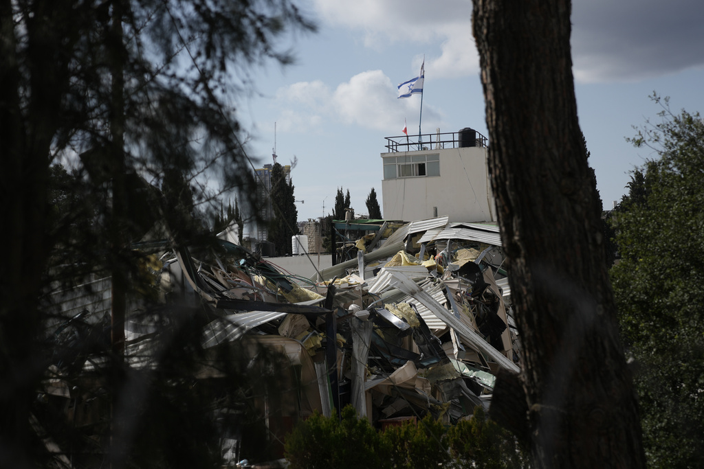 Israeli authorities demolish a UNRWA compound, belonging to the U.N. agency that assists Palestinian refugees, in east Jerusalem Tuesday, Jan. 20, 2026. (AP Photo/Mahmoud Illean)