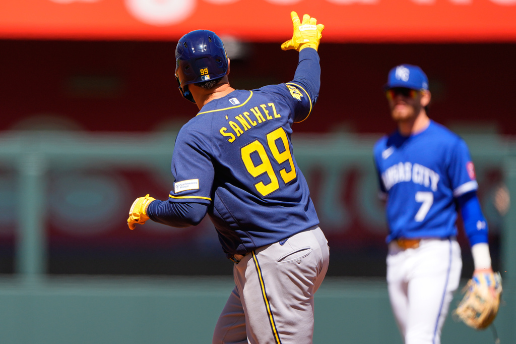 Milwaukee Brewers' Gary Sanchez runs the bases after hitting a two-run home run during the first inning of a baseball game against the Kansas City Royals, Sunday, April 5, 2026, in Kansas City, Mo. (AP Photo/Charlie Riedel)