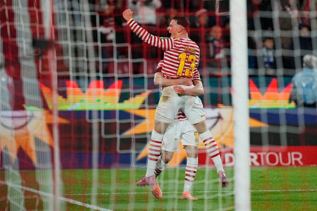 Cologne's Said El Mala celebrates after scoring his side's third goal during the German Bundesliga soccer match between Cologne and Hamburger SV, in Cologne, Germany, Sunday, Nov. 2, 2025. (AP Photo/Martin Meissner)