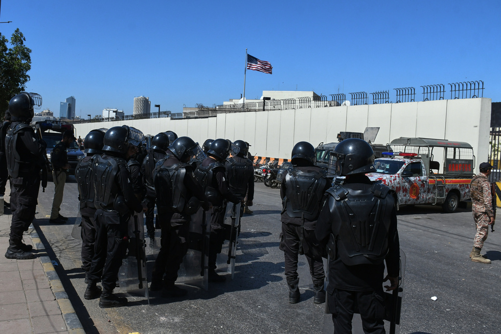 Pakistani security officers stand guard to ensure security outside the U.S. Consulate in Karachi, Pakistan, Wednesday, March 4, 2026. (AP Photo/Ali Raza)