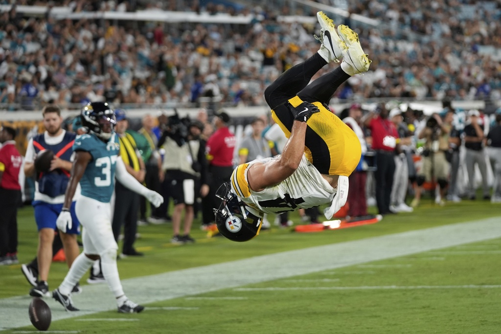 Pittsburgh Steelers running back Max Hurleman (34) celebrates a touchdown catch during the first half of an NFL preseason football game against the Jacksonville Jaguars, Saturday, Aug. 9, 2025, in Jacksonville, Fla. (AP Photo/John Raoux)