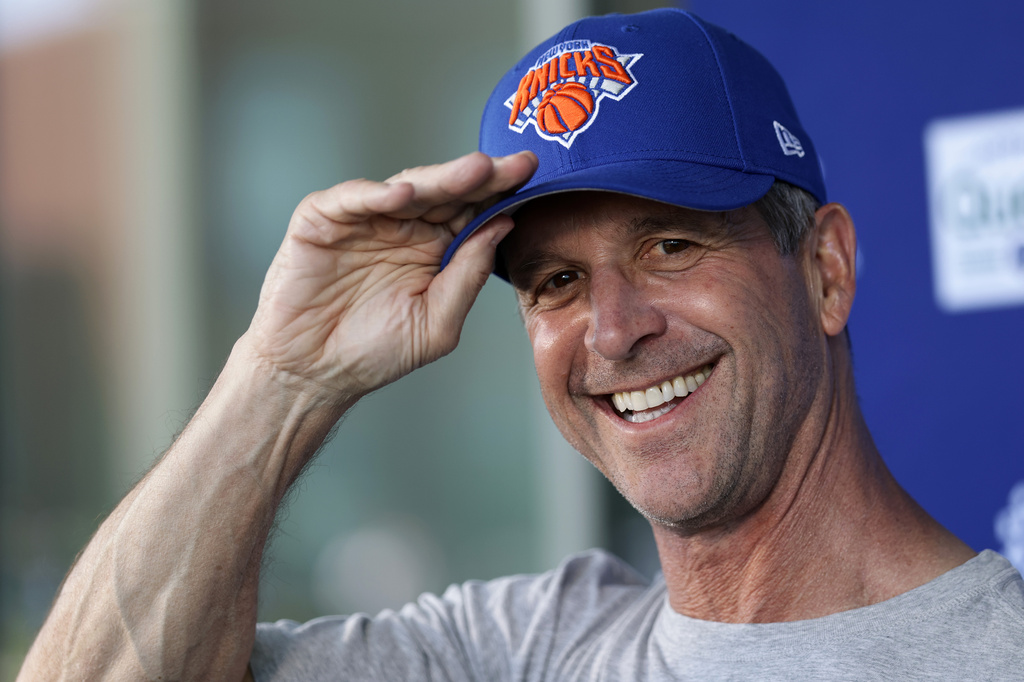 New York Giants head coach John Harbaugh wears a New York Knicks hat while speaking with the media after an NFL football practice Wednesday, June 3, 2026, in East Rutherford, N.J. (AP Photo/Adam Hunger)