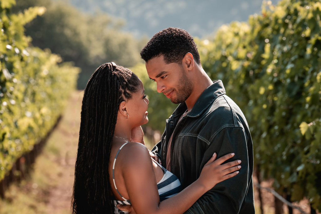 This image released by Universal Pictures shows Halle Bailey, left, and Regé-Jean Page in a scene from "You, Me & Tuscany." (Giulia Parmigiani/Universal Pictures via AP)