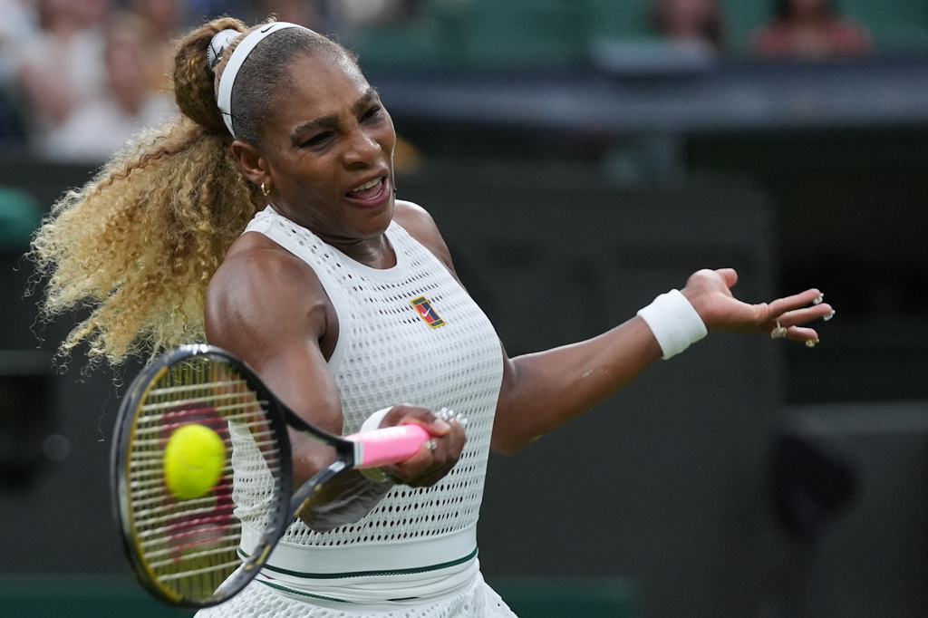 Serena Williams of the United States plays a forehand against Maya Joint of Australia in their first round women's singles match at the Wimbledon Tennis Championships in London, Tuesday, June 30, 2026. (AP Photo/Maja Smiejkowska)