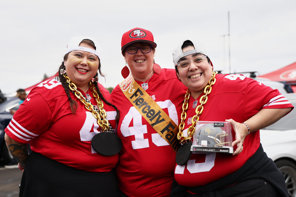 FILE - Fans tailgate outside of Levi's Stadium before an NFL football game between the San Francisco 49ers and the Jacksonville Jaguars in Santa Clara, Calif., Sunday, Sept. 28, 2025. (AP Photo/Kelley L. Cox, File)
