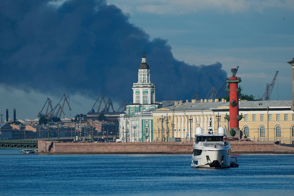 FILE - A plume of black smoke is seen over the port of St. Petersburg, Russia, on June 3, 2026, after a Ukrainian drone attack. (AP Photo, File)
