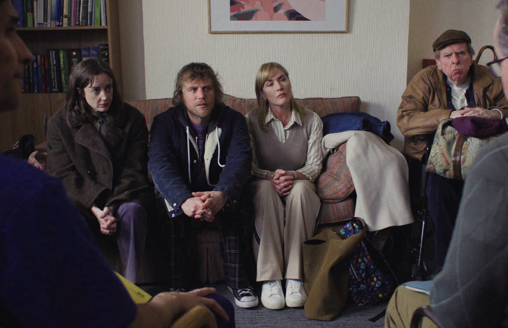 This image released by Netflix shows, from left, Andrea Riseborough, Johnny Flynn, Kate Winslet and Timothy Spall in a scene from "Goodbye June." (Netflix via AP)