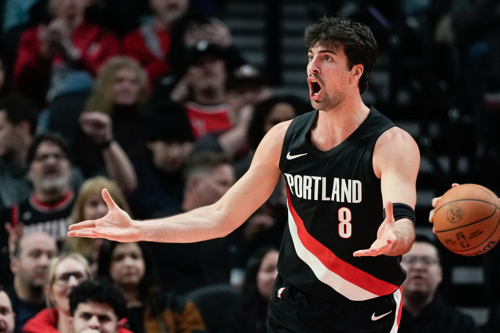 Portland Trail Blazers forward Deni Avdija reacts to a call during the first half of an NBA basketball game against the Brooklyn Nets, Monday, March 23, 2026, in Portland, Ore. (AP Photo/Jenny Kane)