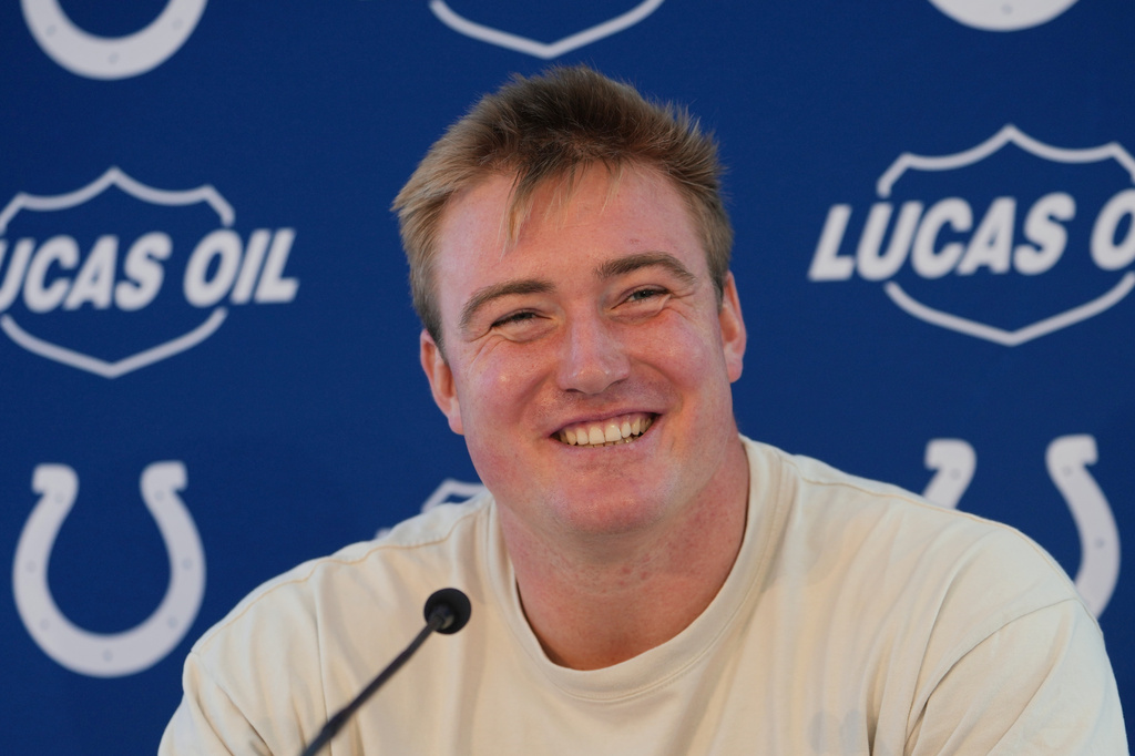 Indianapolis Colts tackle Bernhard Raimann speaks to the media following NFL football practice in Hertfordshire, England, Friday, Oct. 2, 2026. (AP Photo/Kin Cheung)