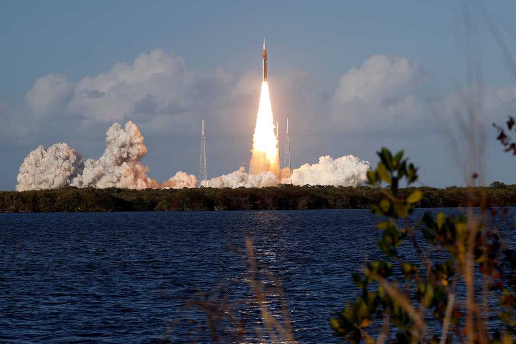 NASA's Artemis II moon rocket lifts off from the Kennedy Space Center's Launch Pad 39-B Wednesday, April 1, 2026, in Cape Canaveral, Fla. (AP Photo/Terry Renna)