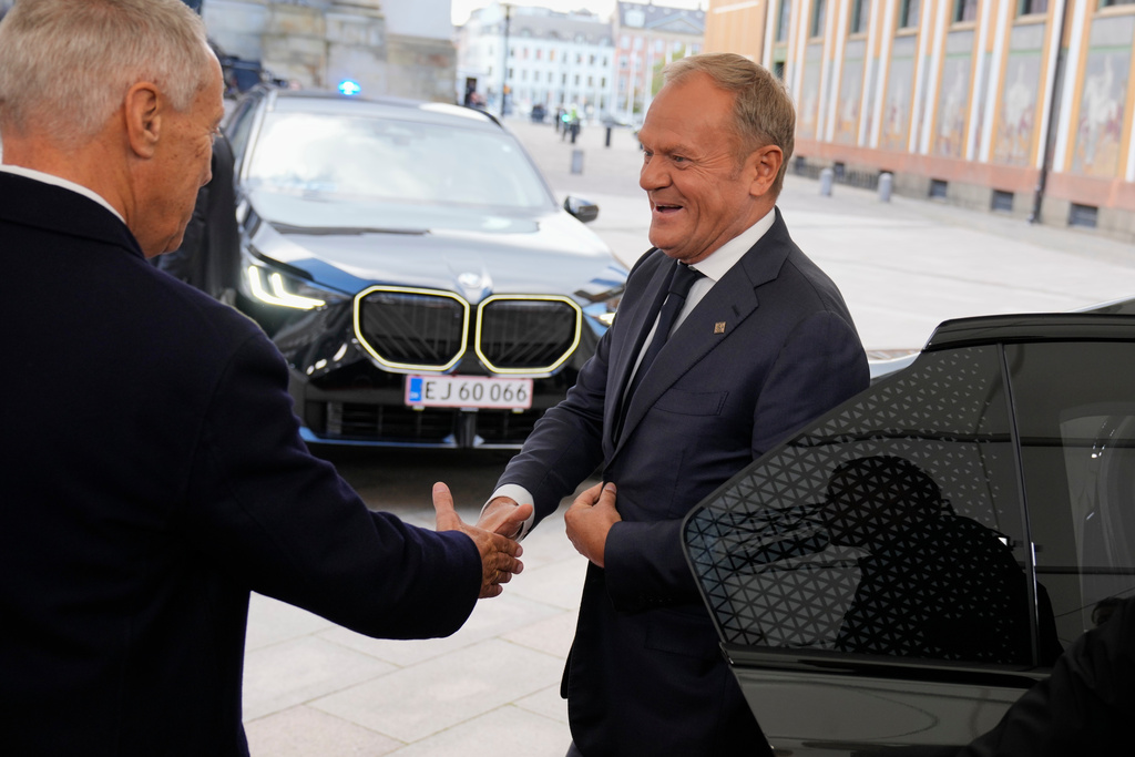 Polish Prime Minister Donald Tusk arrives for an informal summit at the Danish parliament at Christiansborg Castle in Copenhagen, on Wednesday, Oct. 1, 2025. (Thomas Traasdahl/Ritzau Scanpix via AP)