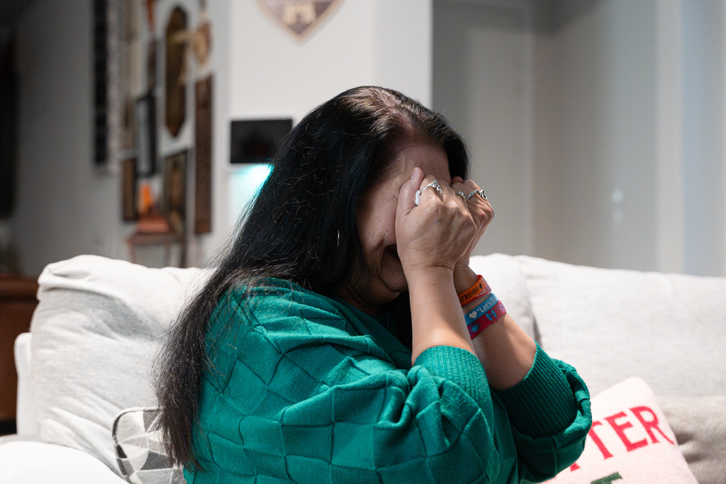 Velma Lisa Duran, sister of Robb Elementary teacher Irma Garcia, cries as she reflects on the 2022 Uvalde, Texas, school shooting during an interview on Dec. 19, 2025, in San Antonio. (AP Photo/Kin Man Hui)
