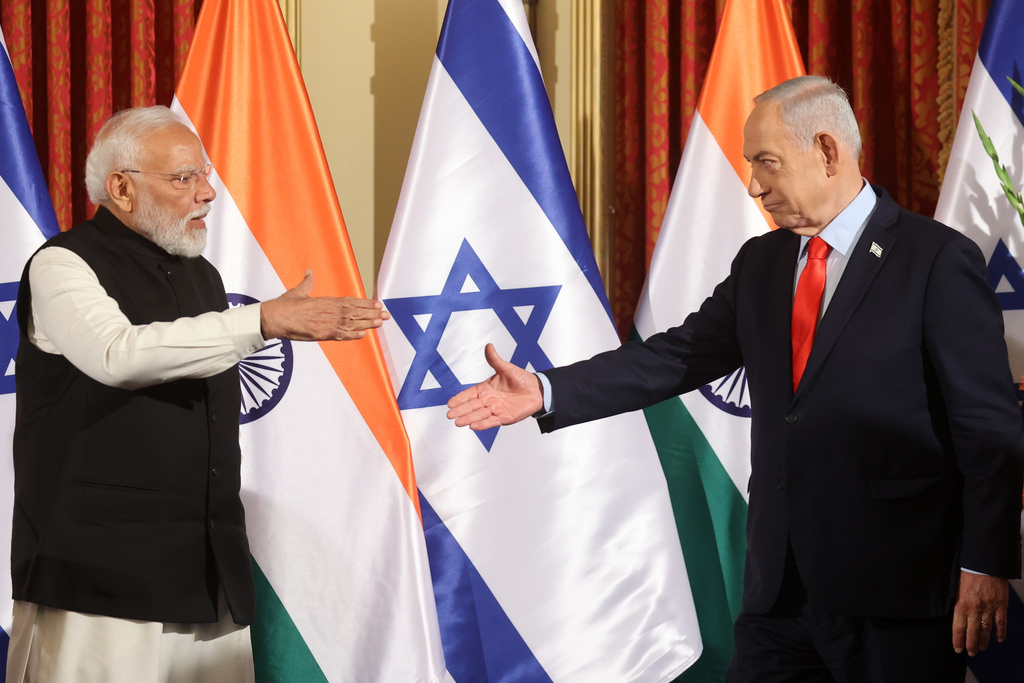 Israel's Prime Minister Benjamin Netanyahu, right, goes to shake hands with his Indian counterpart Narendra Modi during a a press conference in Jerusalem, Thursday, Feb. 26, 2026. (Gil Cohen Magen/Pool Photo via AP)