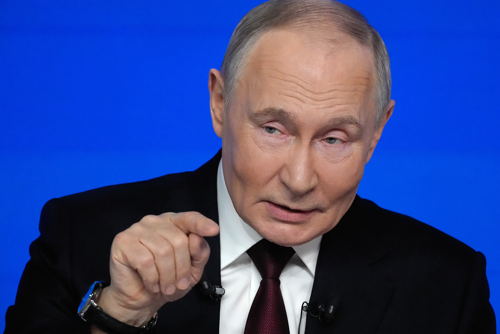 Russian President Vladimir Putin gestures while speaking during his annual news conference and call-in show at Gostinny Dvor, in Moscow, on Friday, Dec. 19, 2025. (AP Photo/Pavel Bednyakov)
