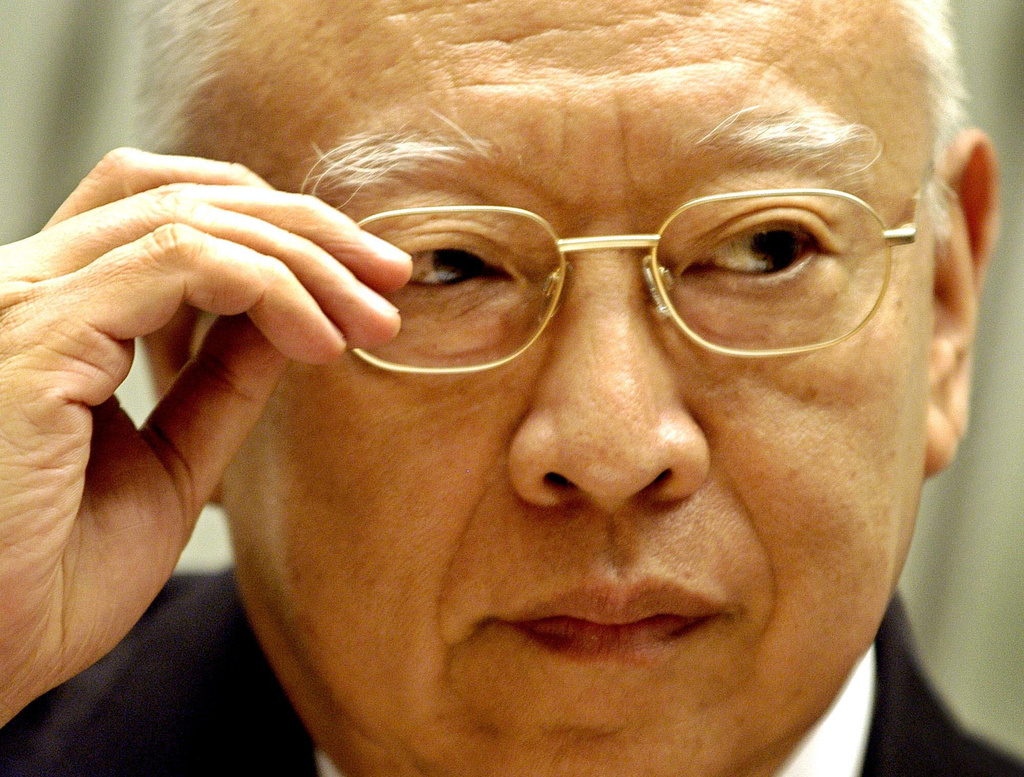 FILE - Hong Kong's Cheif Executive Tung Chee-hwa listens to reporter's question during a news conference at government headquarters in Hong Kong, April 26, 2004. (AP Photo/Vincent Yu, File)