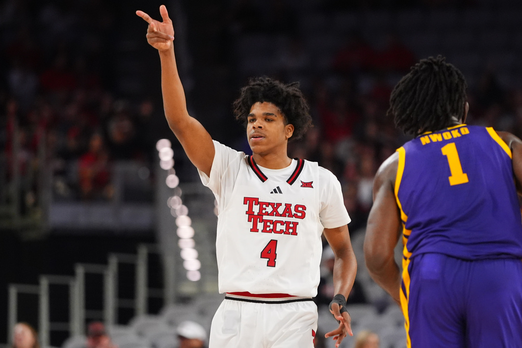 Texas Tech guard Christian Anderson gestures after scoring a 3-point basket during the second half of an NCAA college basketball game against LSU, Sunday, Dec. 7, 2025, in Fort Worth, Texas. (AP Photo/LM Otero)