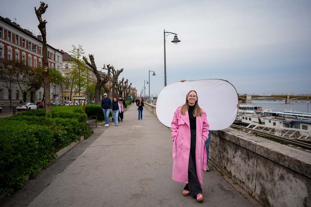 Eszter Tovai, 22, poses for a portrait in Budapest, Hungary, Monday, April 13, 2026. "It was our responsibility to talk to people and change their minds. I personally persuaded seven people to vote for change." (AP Photo/Petr David Josek)