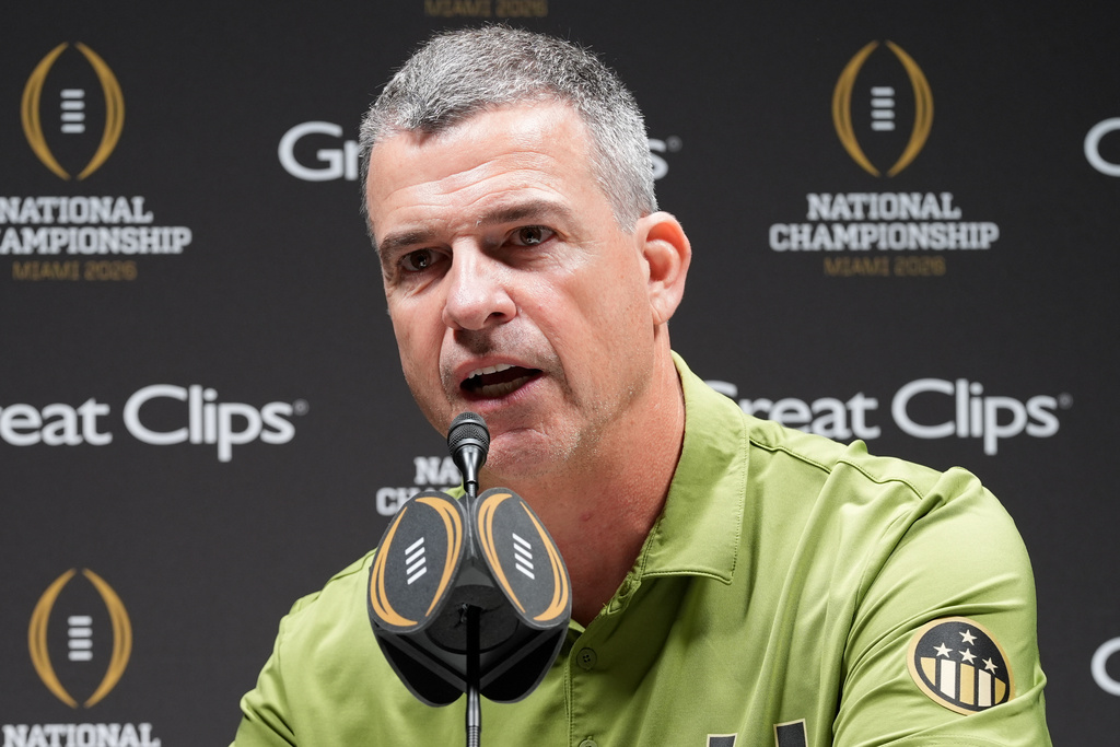 Miami head coach Mario Cristobal speaks during media day ahead of the College Football Playoff national championship game between Miami and Indiana, Saturday, Jan. 17, 2026, in Miami. The game will be played on Monday. (AP Photo/Marta Lavandier)