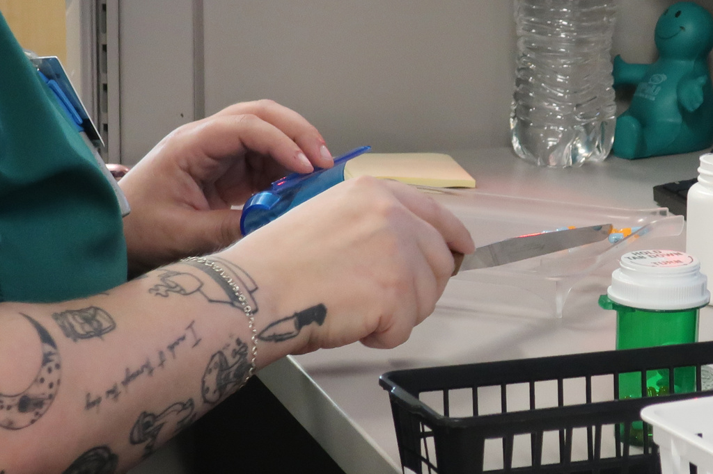 Kat Knoxsah, a pharmacy technician fills a prescription at the Stormont Vail Retail Pharmacy in Topeka, Kan., Tuesday, June 2, 2026. (AP Photo/John Hanna)