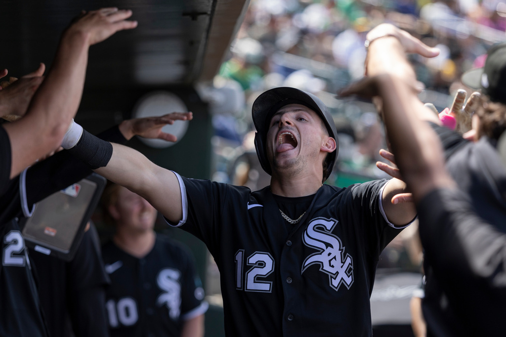 Chicago White Sox's Colson Montgomery celebrates after hitting a home run during the fifth inning of a baseball game against the Athletics, Sunday, April 19, 2026, in West Sacramento, Calif. (AP Photo/Sara Nevis)