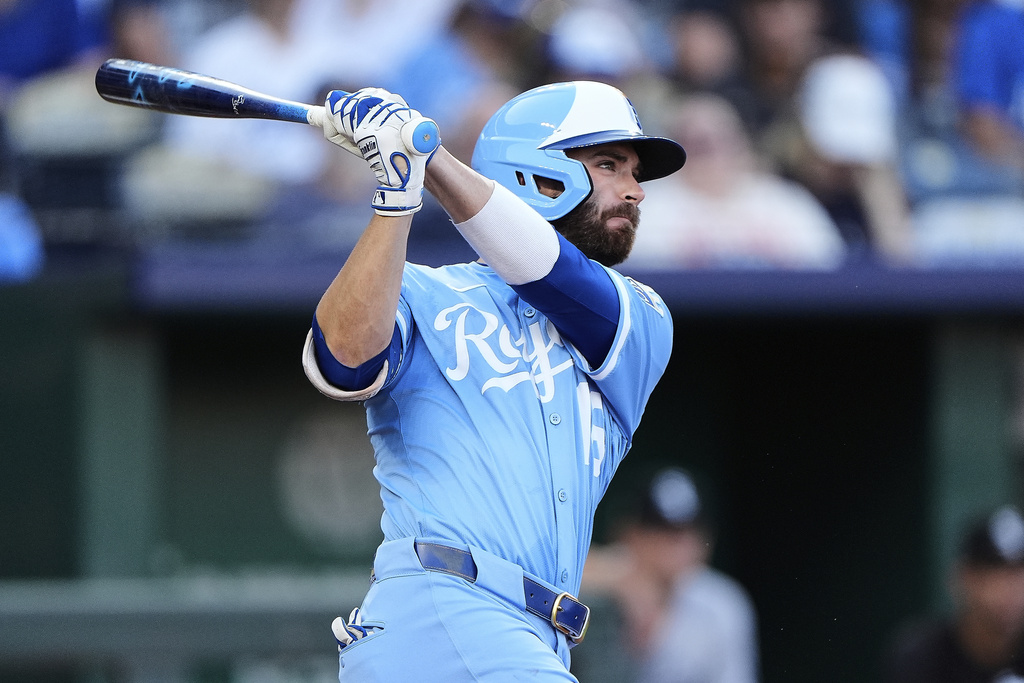 Kansas City Royals' John Rave watches his solo home run during the third inning of a baseball game Saturday, Aug. 16, 2025, in Kansas City, Mo. (AP Photo/Charlie Riedel)