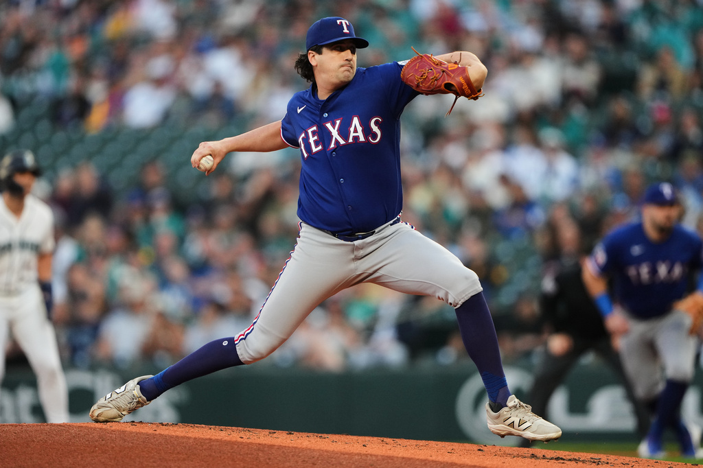 Texas Rangers starting pitcher Cal Quantrill throws against the Seattle Mariners during the first inning of a baseball game, Tuesday, Sept. 8, 2026, in Seattle. (AP Photo/Lindsey Wasson)