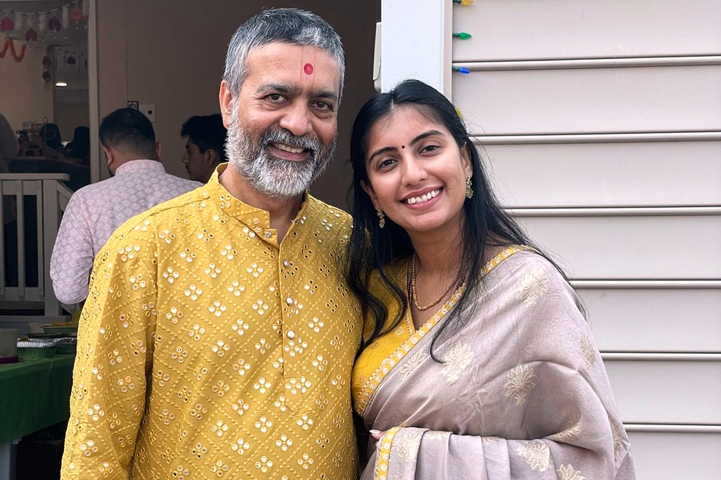 This 2022 photo provided by Mukti Patel shows Umesh Kumar and his daughter, Akanksha, in Richmond, Va. (Mukti Patel via AP)