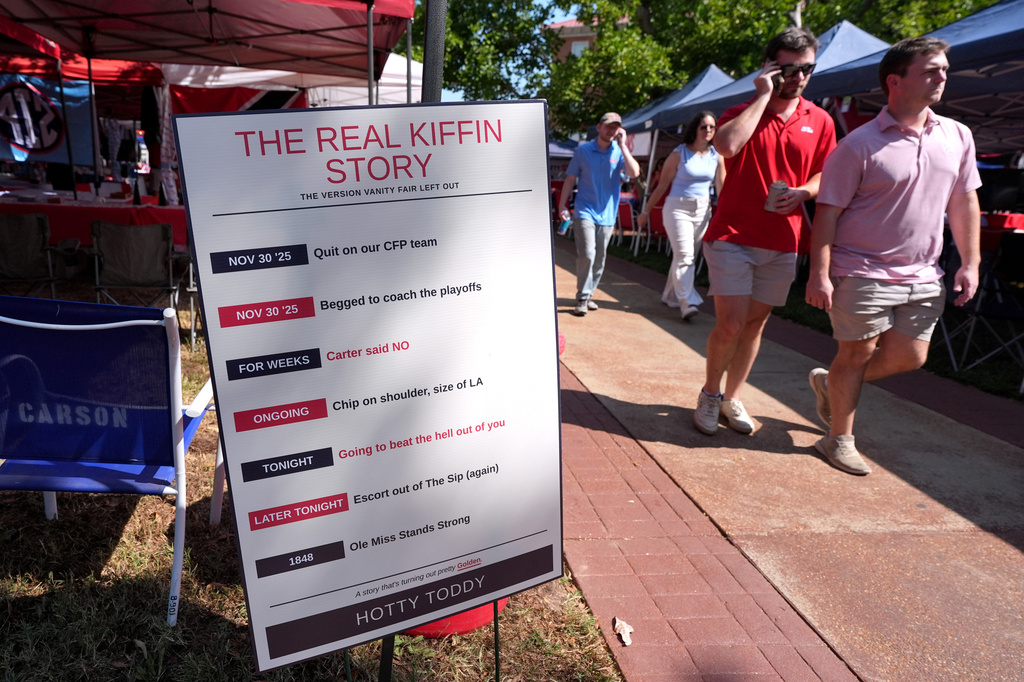 A tailgating sign critical of LSU football coach Lane Kiffin, who was the former head coach of Mississippi is posted in The Grove prior to their NCAA college football game against Mississippi in Oxford, Miss., Saturday, Sept. 19, 2026. (AP Photo/Rogelio V. Solis)