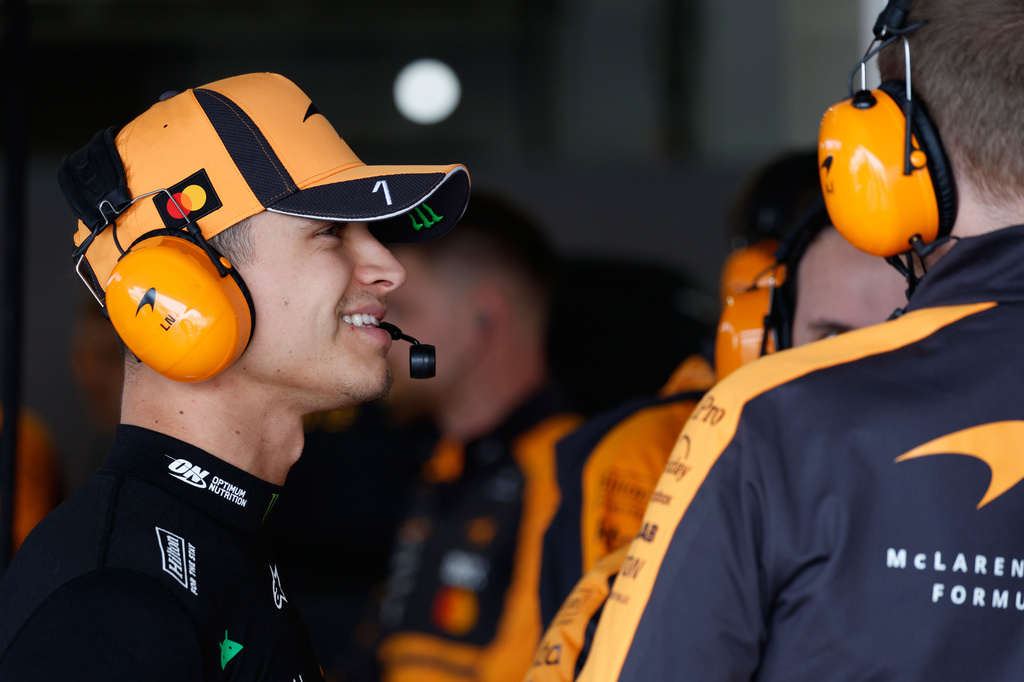 McLaren driver Lando Norris of Britain talks with team members ahead of the qualifying session of the Japanese Formula One Grand Prix at the Suzuka Circuit in Suzuka, Japan, Saturday, March 28, 2026. (Franck Robichon/Pool Photo via AP)