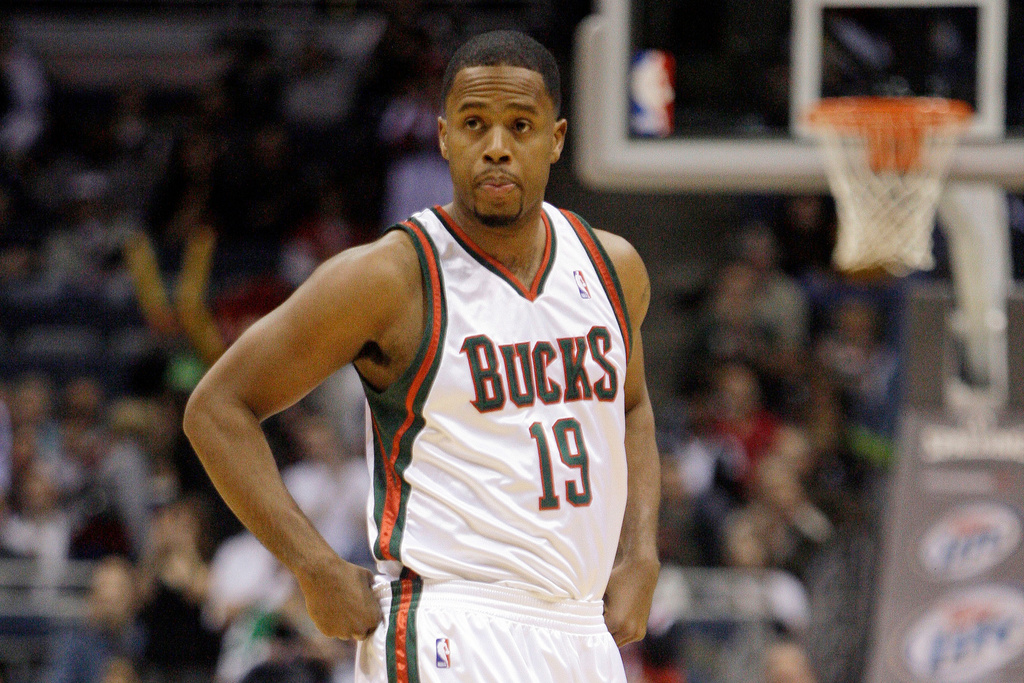 FILE - Milwaukee Bucks' Damon Jones looks on during the second half of an NBA basketball game, Wednesday, Jan. 21, 2009, in Milwaukee. (AP Photo/Morry Gash, File)