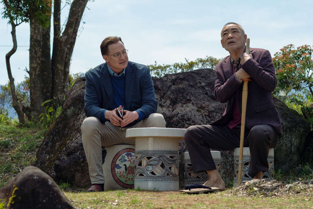 This image released by Searchlight Pictures shows Brendan Fraser, left, and Akira Emoto in a scene from "Rental Family." (James Lisle/Searchlight Pictures via AP)